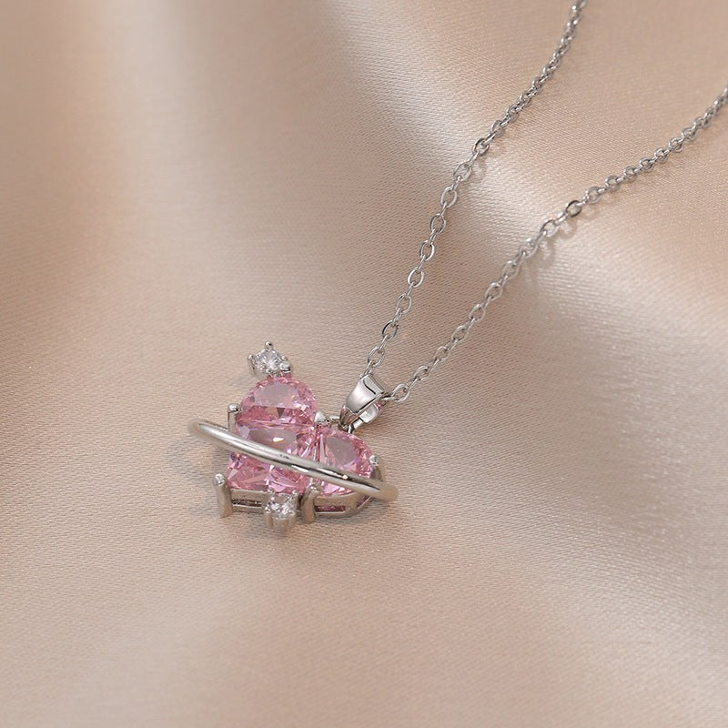 Cosmo Amor — Collar Corazón con Anillo Planetario